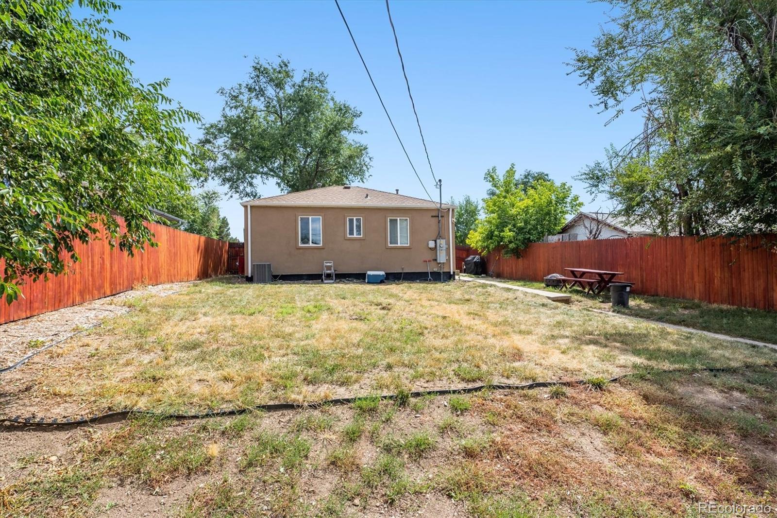 631 South Raleigh Street Denver, CO 80219 - Photo 14 of 15 a house view with a garden