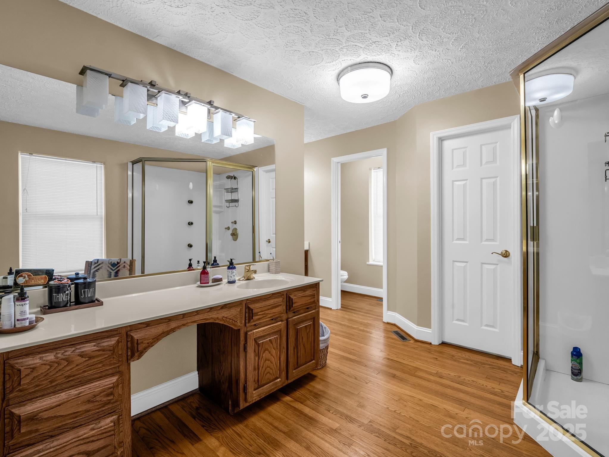 505 Crawley Gin Road Shelby, NC 28150 - Photo 11 of 48 a bathroom with a double vanity sink and a mirror