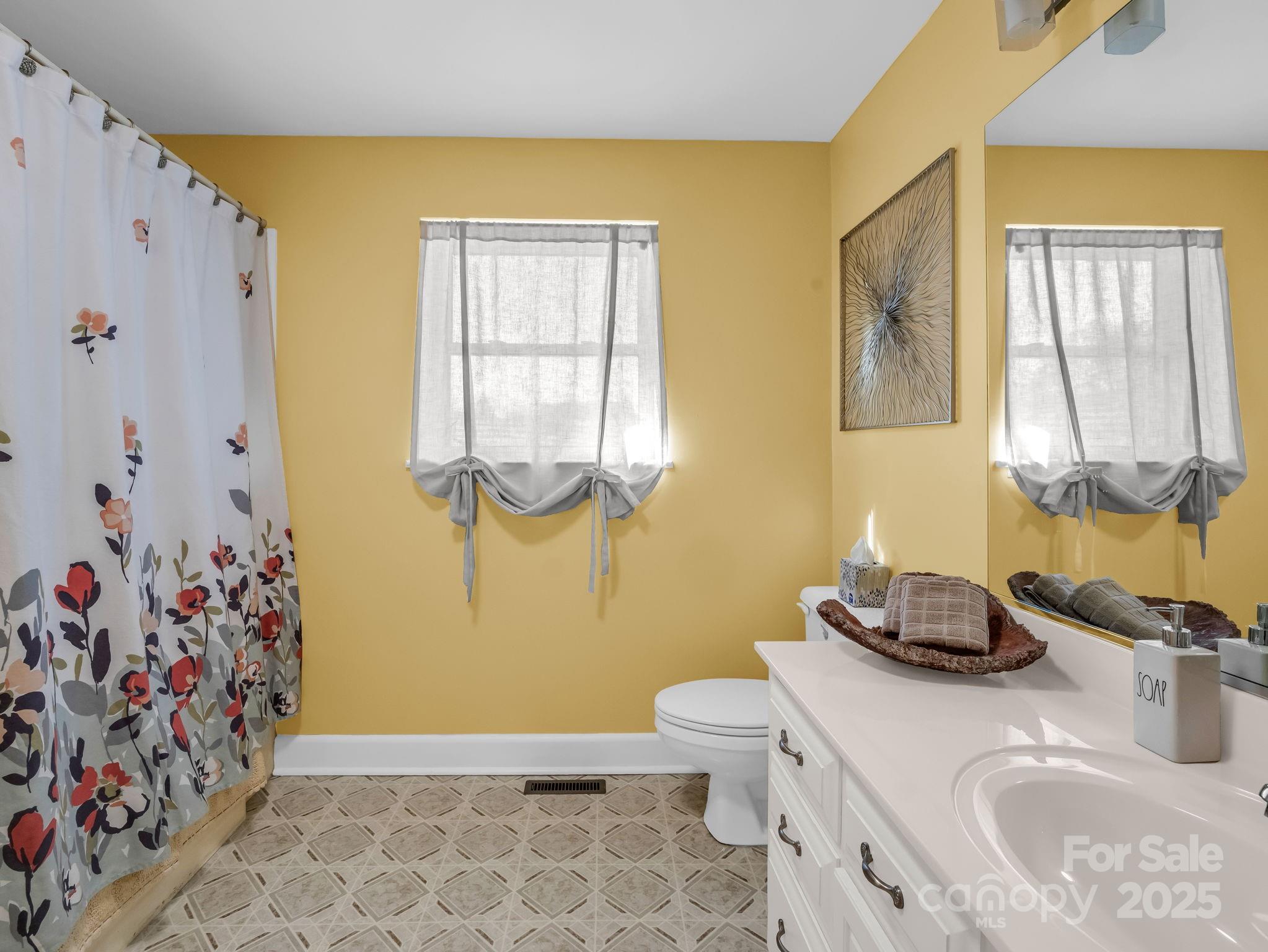 505 Crawley Gin Road Shelby, NC 28150 - Photo 15 of 48 a bathroom with a sink toilet and shower