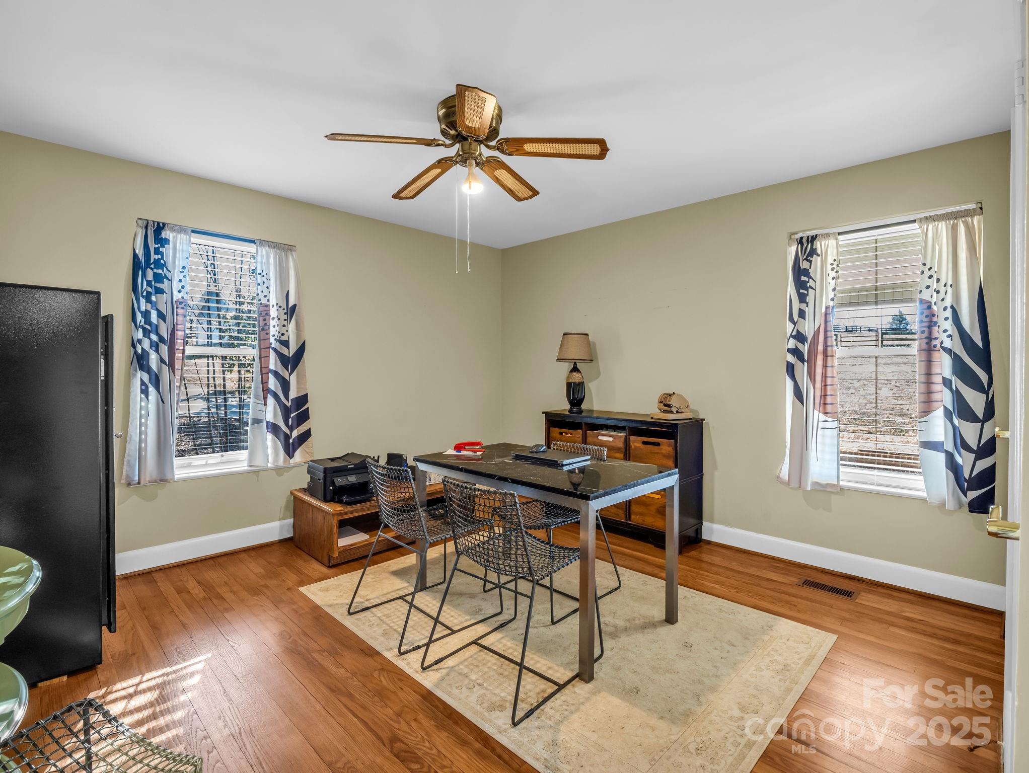 505 Crawley Gin Road Shelby, NC 28150 - Photo 16 of 48 a view of a workspace with furniture and a window