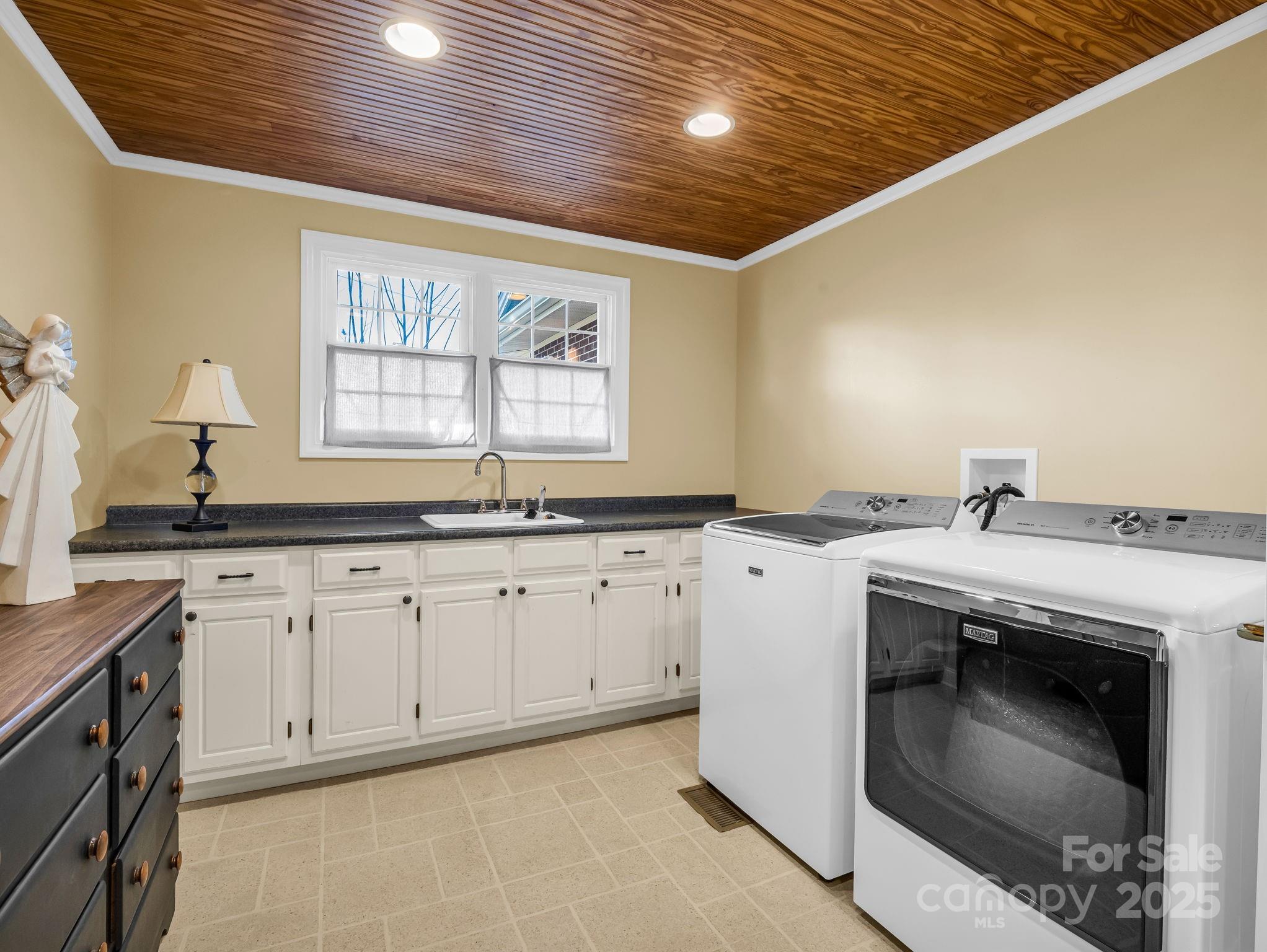 505 Crawley Gin Road Shelby, NC 28150 - Photo 18 of 48 a kitchen with granite countertop white cabinets and white appliances