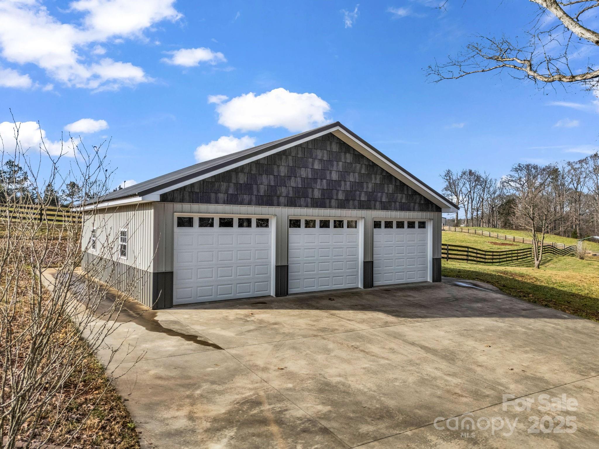 505 Crawley Gin Road Shelby, NC 28150 - Photo 24 of 48 a front view of a house with a yard and garage