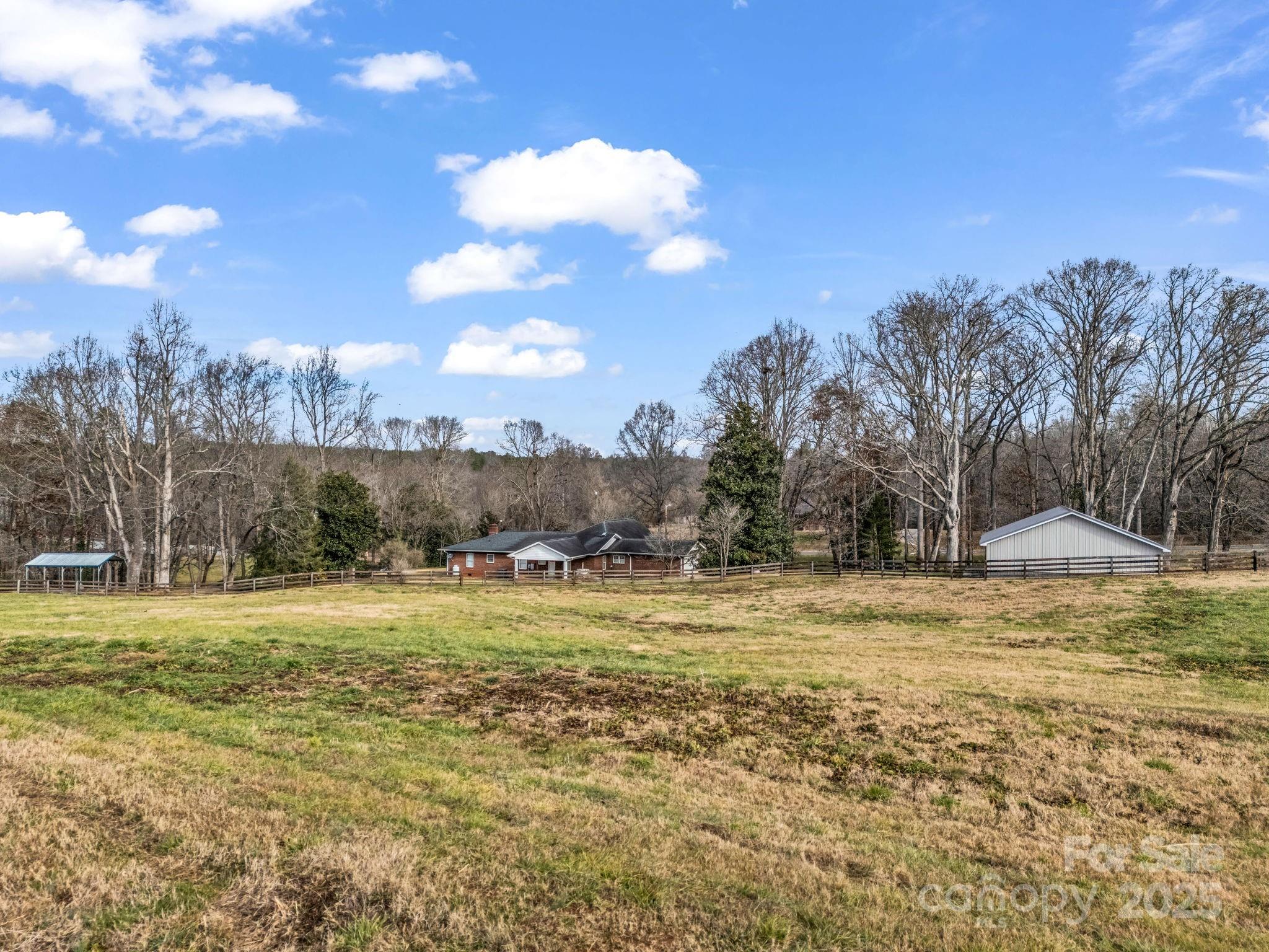 505 Crawley Gin Road Shelby, NC 28150 - Photo 27 of 48 a view of large trees with a yard
