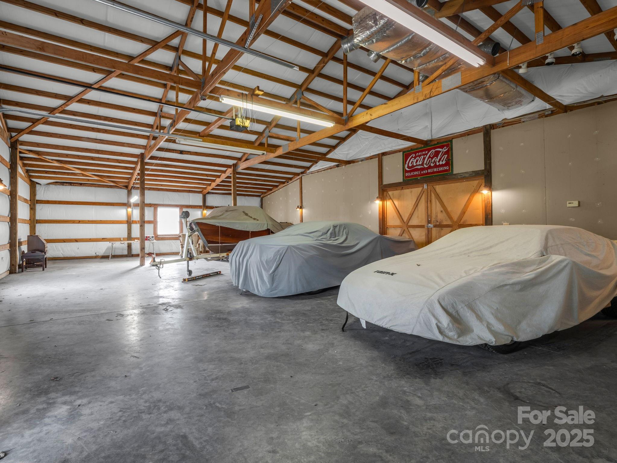 505 Crawley Gin Road Shelby, NC 28150 - Photo 29 of 48 a bedroom with bed and a walk in closet