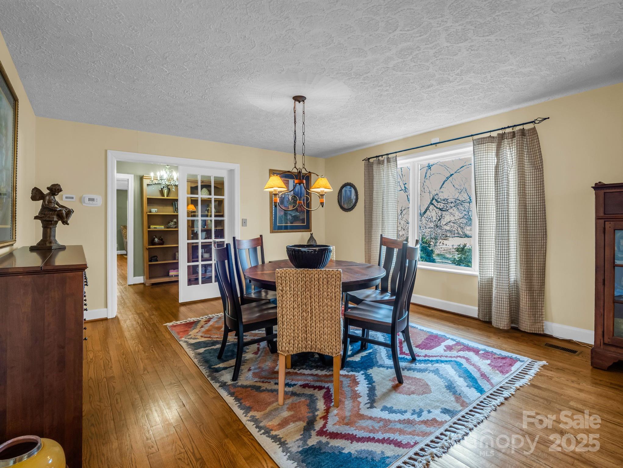 505 Crawley Gin Road Shelby, NC 28150 - Photo 7 of 48 a dining room with furniture window wooden floor