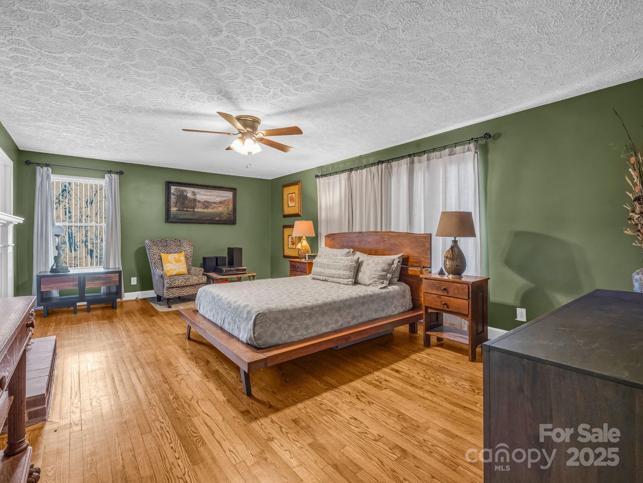 505 Crawley Gin Road Shelby, NC 28150 - Photo 9 of 48 a bedroom with a bed and wooden floor