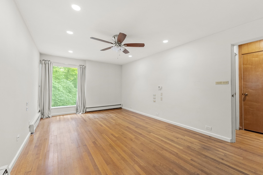 505 Mountain Road Wilbraham, MA 01095 - Photo 17 of 35 a view of a big room with wooden floor and windows