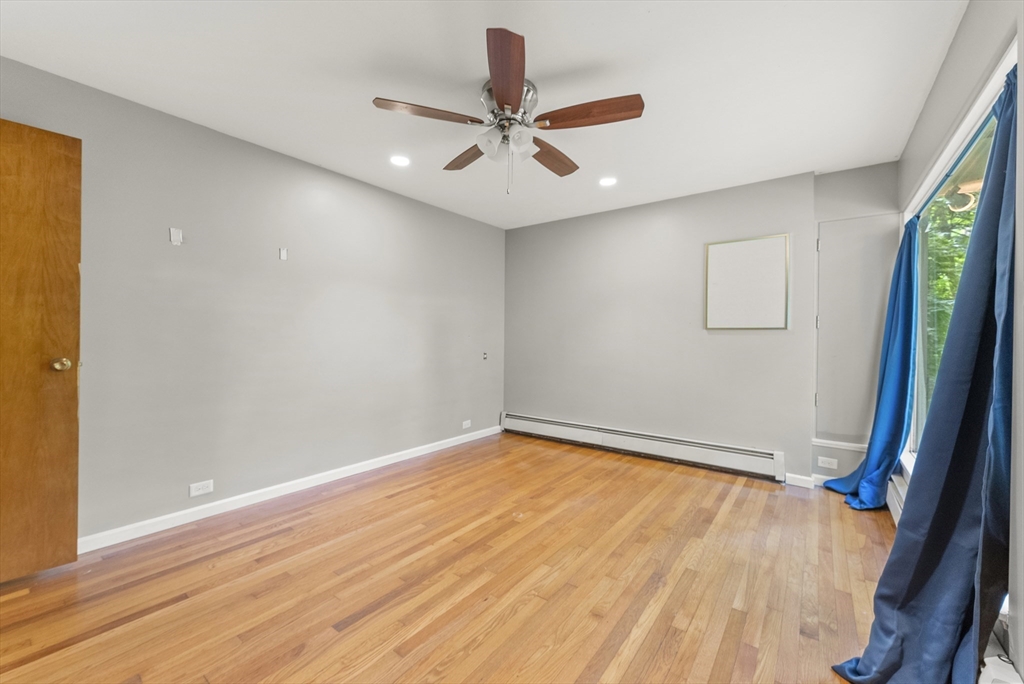 505 Mountain Road Wilbraham, MA 01095 - Photo 22 of 35 wooden floor in an empty room with a window