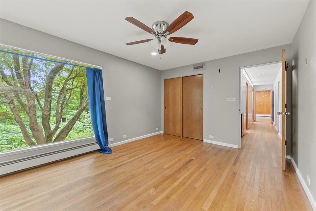 505 Mountain Road Wilbraham, MA 01095 - Photo 24 of 35 wooden floor in an empty room with a window