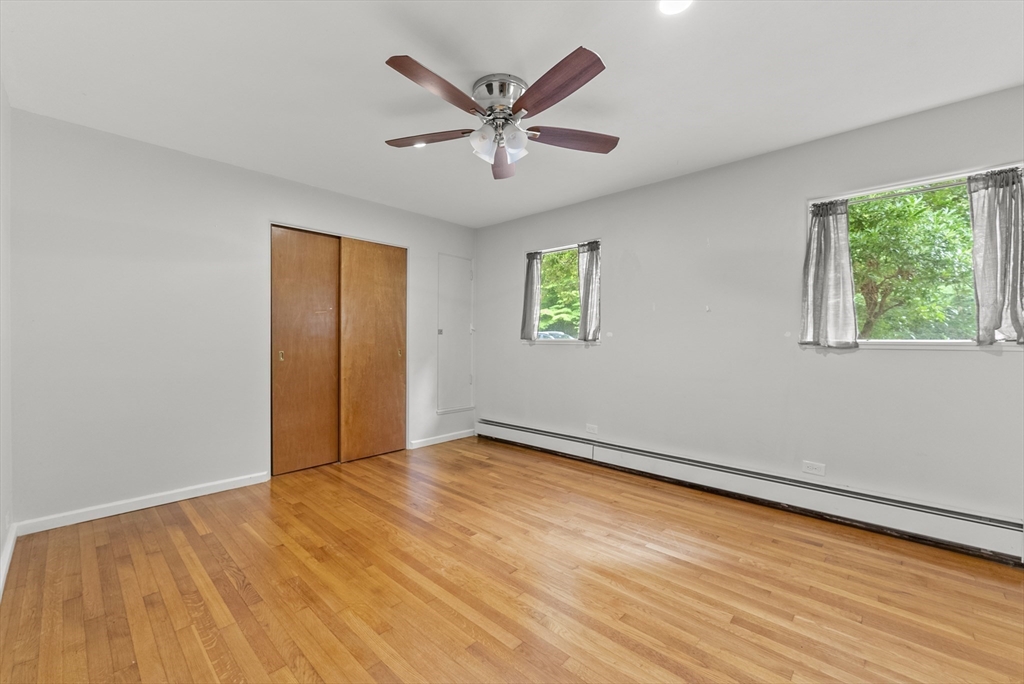 505 Mountain Road Wilbraham, MA 01095 - Photo 26 of 35 a view of an empty room with wooden floor and a window