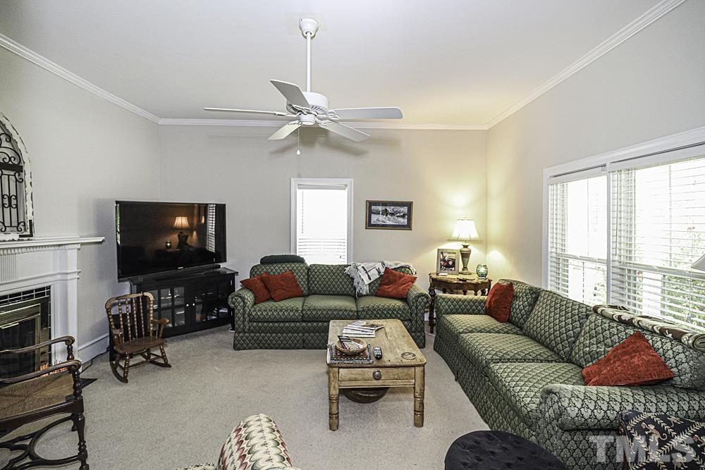 3188 Macedonia Road Spring Hope, NC 27882 - Photo 18 of 84 a living room with furniture and a flat screen tv