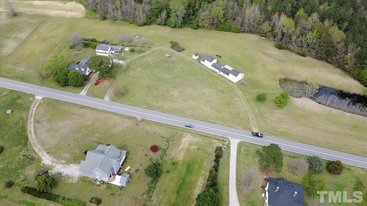 3188 Macedonia Road Spring Hope, NC 27882 - Photo 4 of 84 an aerial view of a house