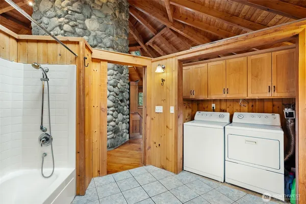 a utility room with dryer and washer