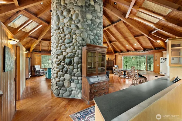 a view of a backyard with sitting area