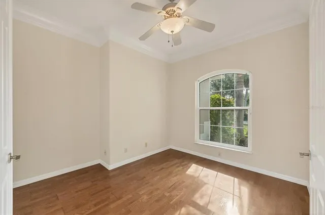 a view of a hallway with wooden shelves and entryway
