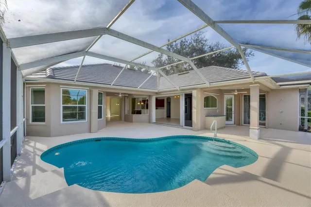 front view of a house with a swimming pool