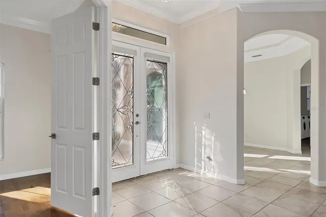 a view of a bathroom with a glass door and a shower