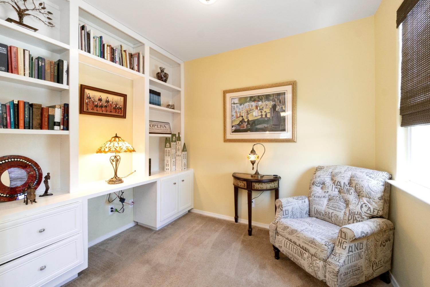 4103 Harlan Ranch Boulevard Clovis, CA 93619 - Photo 11 of 31 a living room with furniture and baby crib