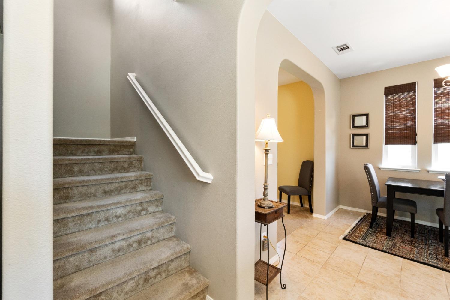 4103 Harlan Ranch Boulevard Clovis, CA 93619 - Photo 14 of 31 a view of a hallway with furniture and a window