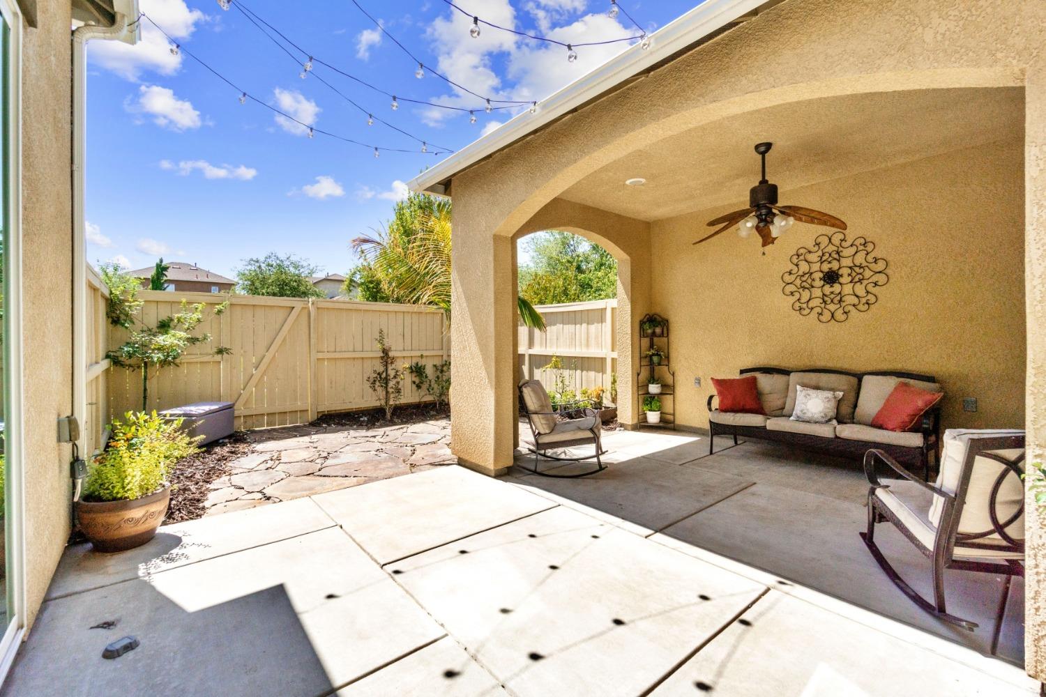 4103 Harlan Ranch Boulevard Clovis, CA 93619 - Photo 23 of 31 a living room with furniture and a large window