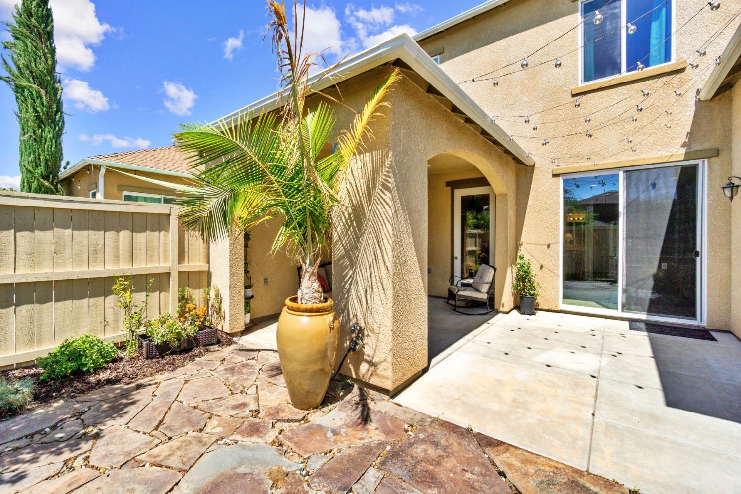 4103 Harlan Ranch Boulevard Clovis, CA 93619 - Photo 24 of 31 a view of a house with many windows
