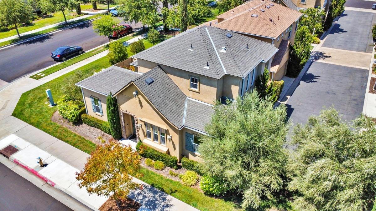 4103 Harlan Ranch Boulevard Clovis, CA 93619 - Photo 26 of 31 an aerial view of a house with a yard