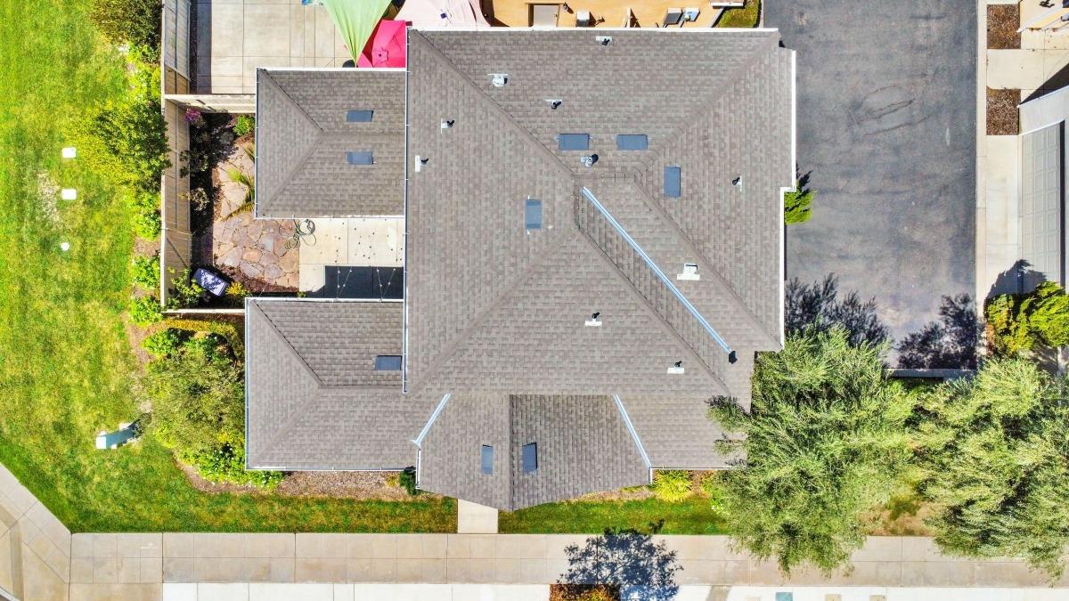 4103 Harlan Ranch Boulevard Clovis, CA 93619 - Photo 28 of 31 front view of a house with a garden