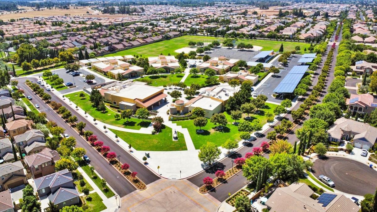 4103 Harlan Ranch Boulevard Clovis, CA 93619 - Photo 30 of 31 an aerial view of residential houses with outdoor space