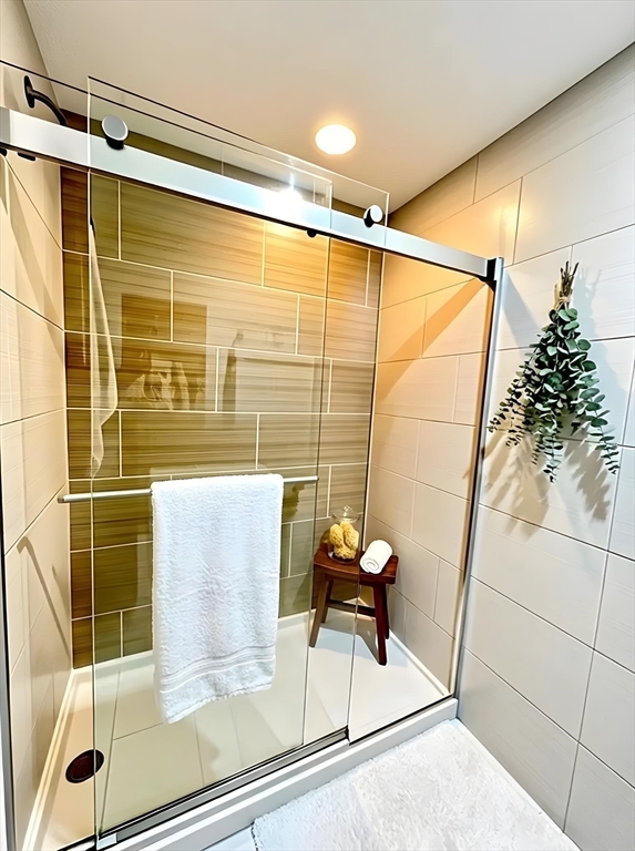 9 Anderson Street, Unit 1R Boston, MA 02114 - Photo 6 of 13 a bathroom with a shower