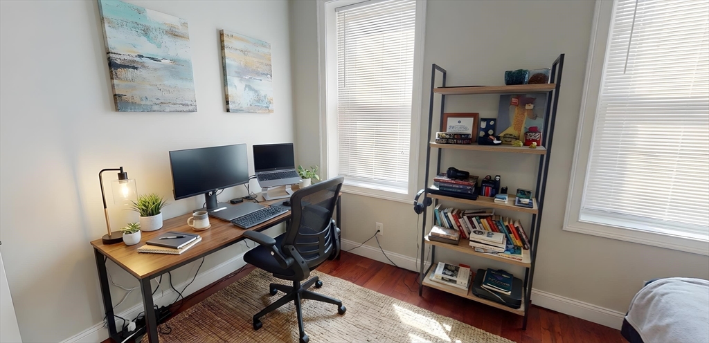 9 Anderson Street, Unit 1R Boston, MA 02114 - Photo 7 of 13 a view of a workspace with furniture and a window