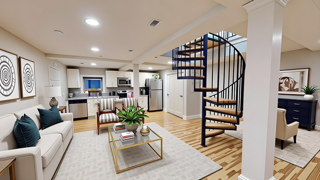 9 Anderson Street, Unit 1R Boston, MA 02114 - Photo 10 of 13 a living room with furniture kitchen view and a wooden floor