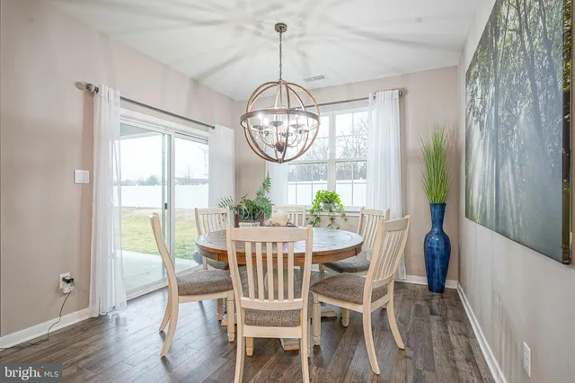 a en suite bathroom with a double sink and mirror
