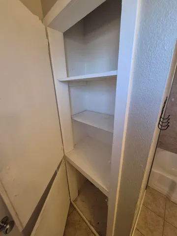 a bathroom with a sink and washing machine