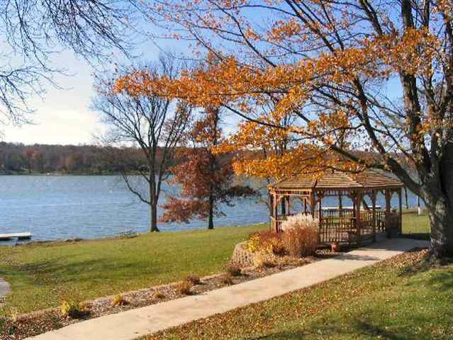 832 Drexel Road Lake Summerset, IL 61019 - Photo 9 of 11 a front view of a house with a yard and lake view