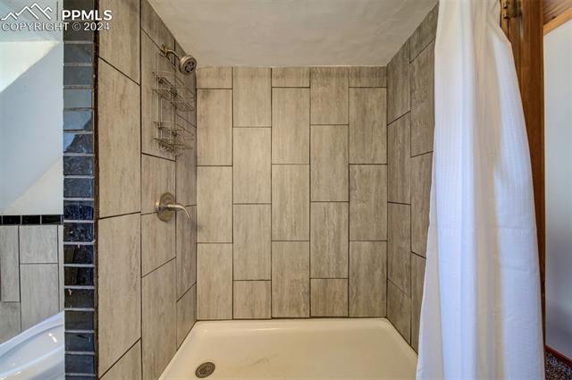 19350 Lemesany Road Calhan, CO 80808 - Photo 38 of 46 Bathroom with tile walk in shower