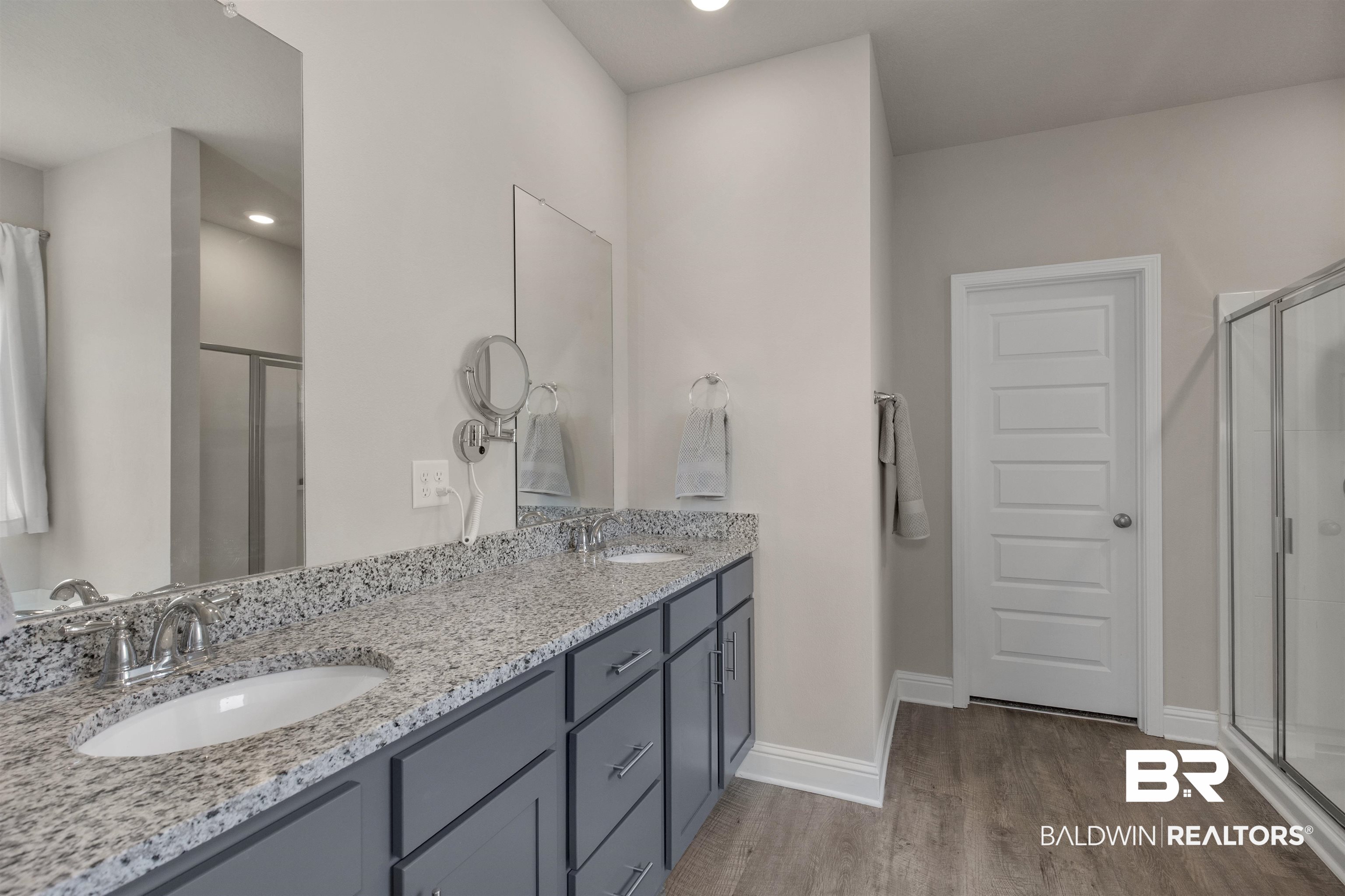 2345 Laurel Street Semmes, AL 36575 - Photo 15 of 31 Full bath featuring wood finished floors, a shower stall, double vanity, and recessed lighting