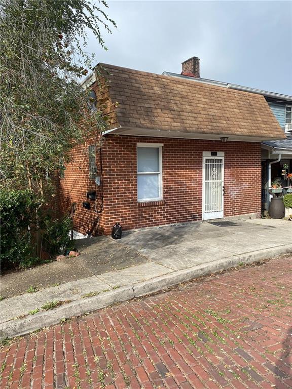 107 Overbrook Boulevard Pittsburgh, PA 15210 - Photo 1 of 21 a front view of a house