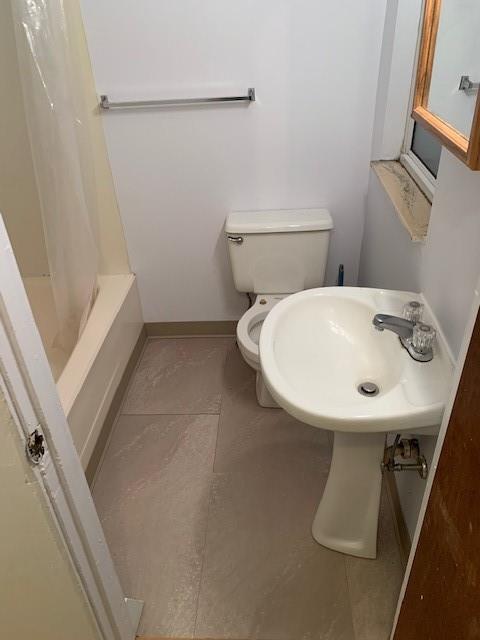 107 Overbrook Boulevard Pittsburgh, PA 15210 - Photo 16 of 21 a bathroom with a sink a toilet and shower