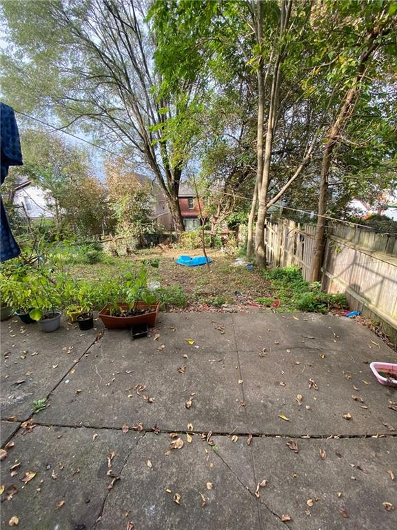107 Overbrook Boulevard Pittsburgh, PA 15210 - Photo 5 of 21 a backyard of a house with lots of green space