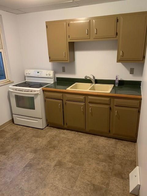 107 Overbrook Boulevard Pittsburgh, PA 15210 - Photo 10 of 21 a kitchen with stainless steel appliances granite countertop a sink and a stove