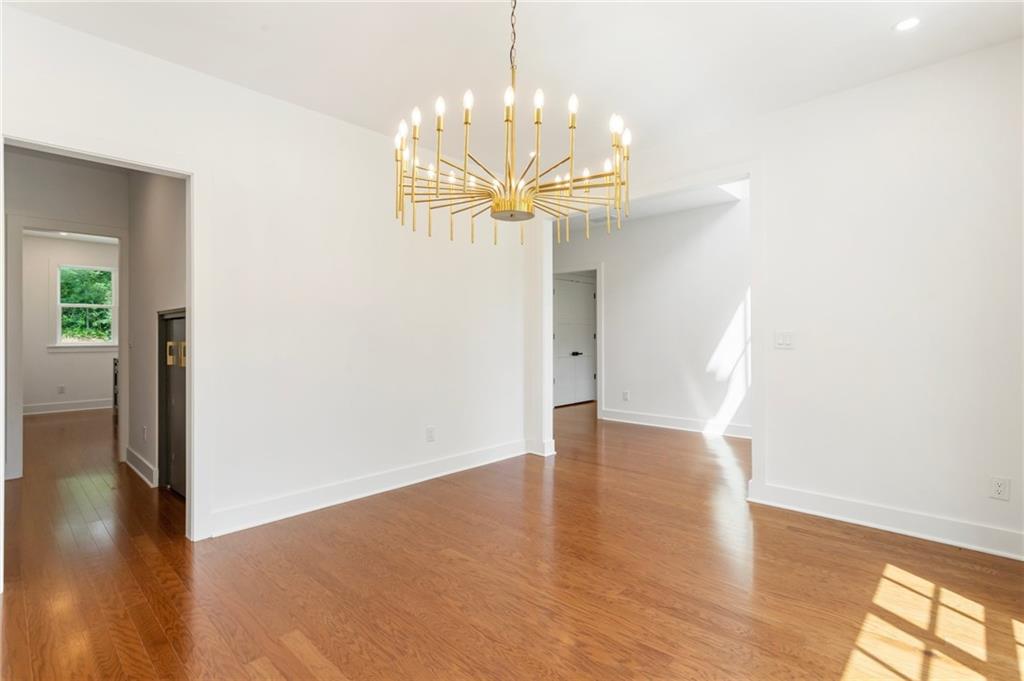 3711 Mountain Cove Road Snellville, GA 30039 - Photo 16 of 78 a view of a chandelier in a room