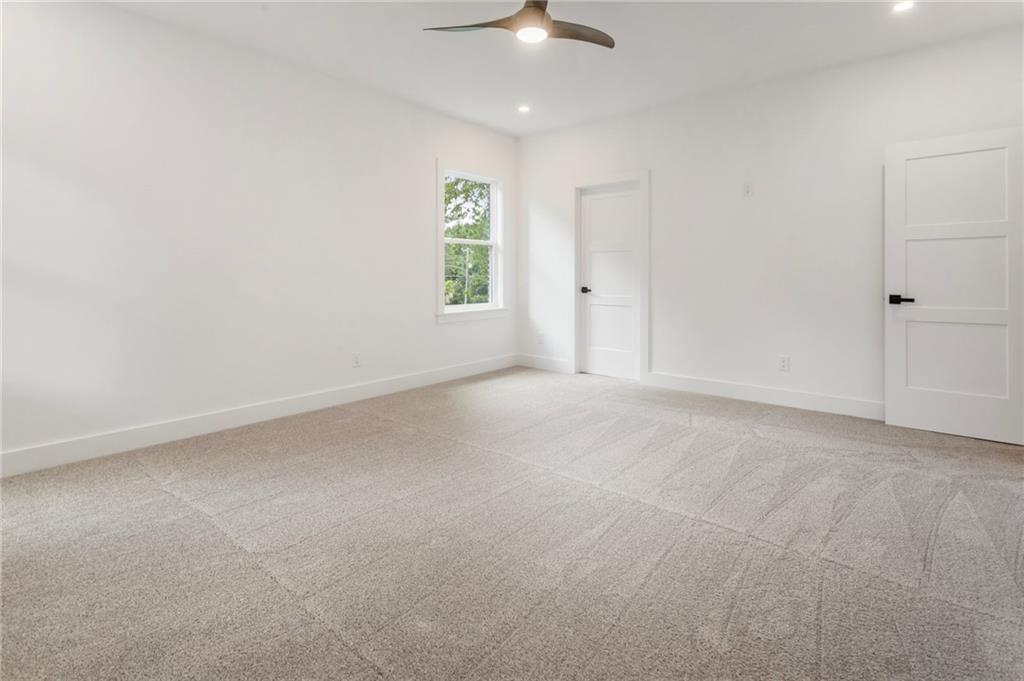 3711 Mountain Cove Road Snellville, GA 30039 - Photo 48 of 78 a view of an empty room with a window