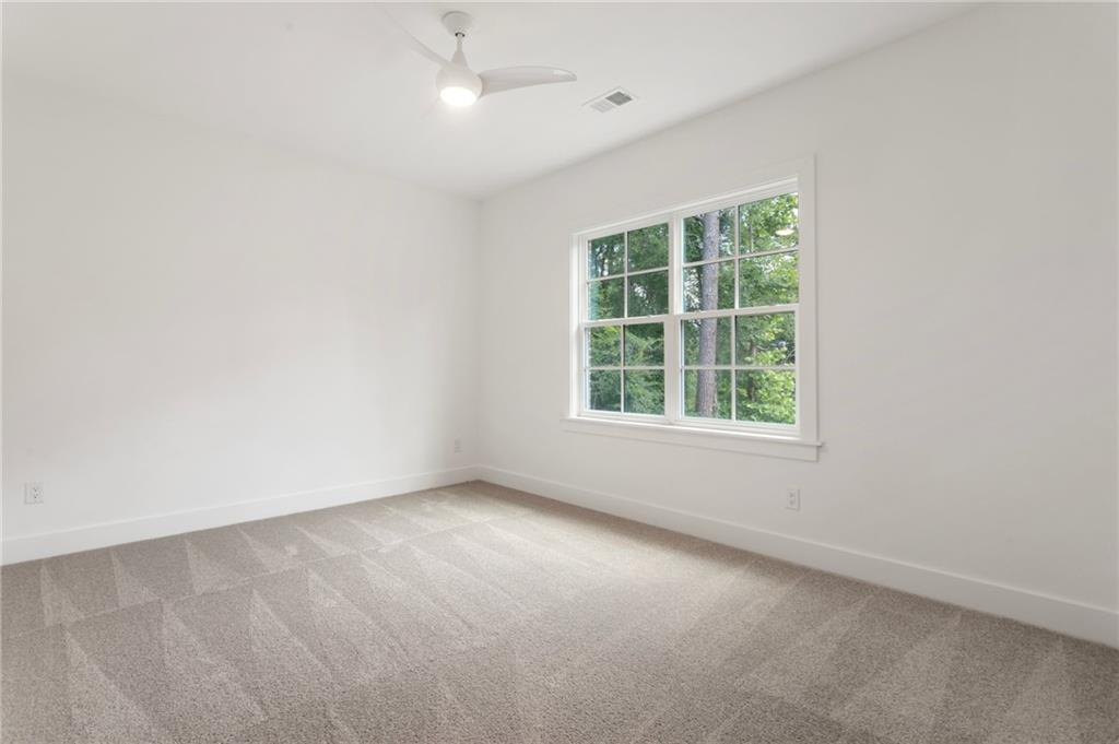 3711 Mountain Cove Road Snellville, GA 30039 - Photo 68 of 78 an empty room with a window