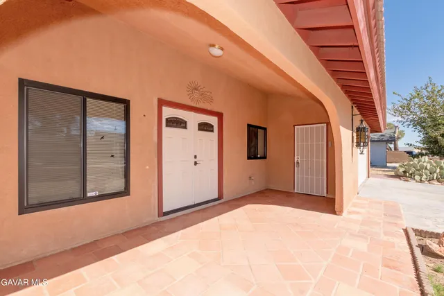 a view of a house with a outdoor space and garage