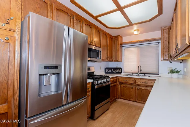 a view of a living room with a wooden floor