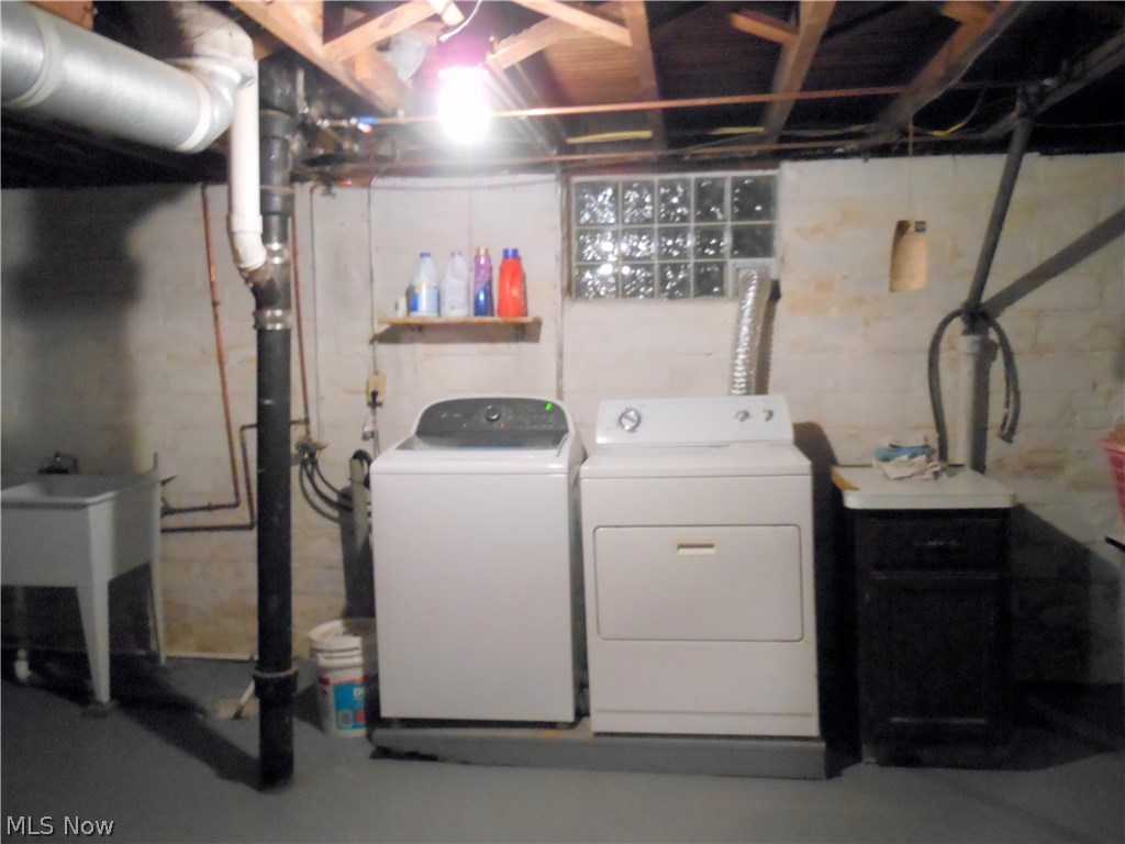 891 Montford Road Cleveland, OH 44121 - Photo 22 of 25 Washer & Dryer will Stay. Glass Block Windows, freshly painted basement floor!