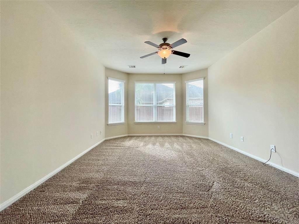 25015 Diamond Ranch Drive Katy, TX 77494 - Photo 12 of 27 a view of an empty room with a window