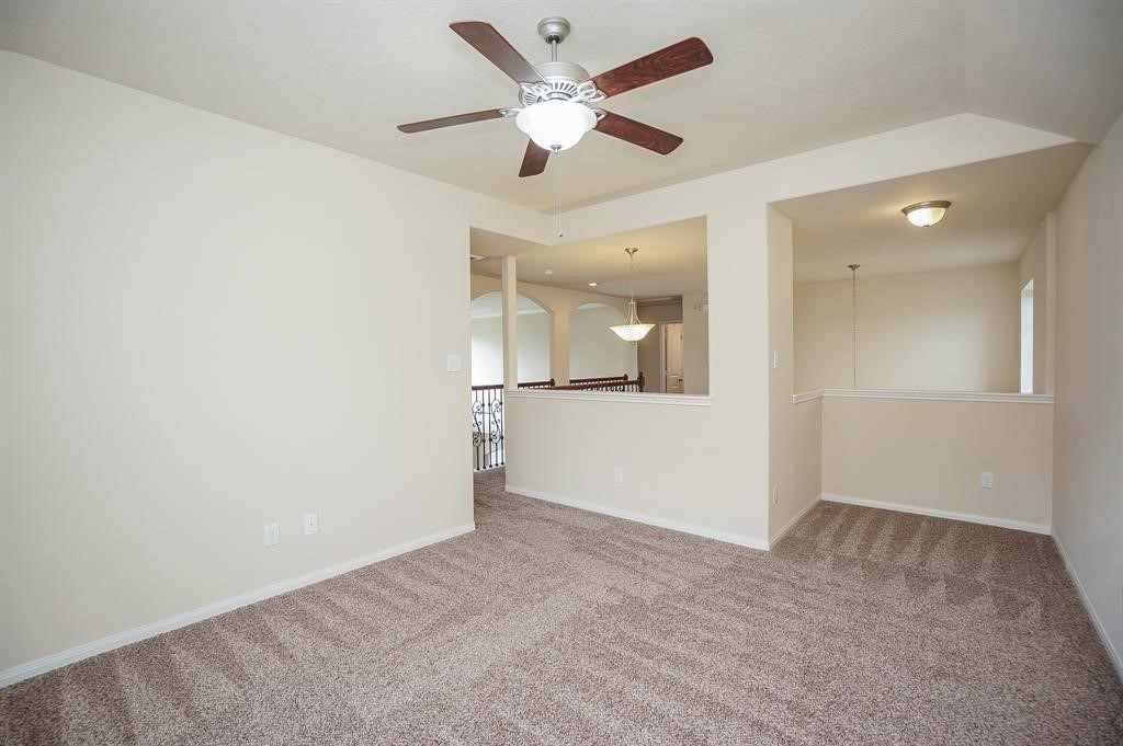 25015 Diamond Ranch Drive Katy, TX 77494 - Photo 18 of 27 an empty room with a bathroom