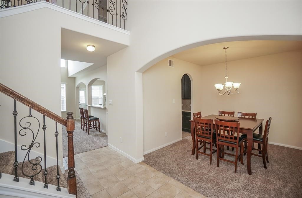 25015 Diamond Ranch Drive Katy, TX 77494 - Photo 4 of 27 a view of a livingroom with furniture and entryway
