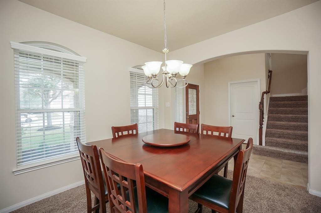 25015 Diamond Ranch Drive Katy, TX 77494 - Photo 5 of 27 a view of a dining room with furniture and window